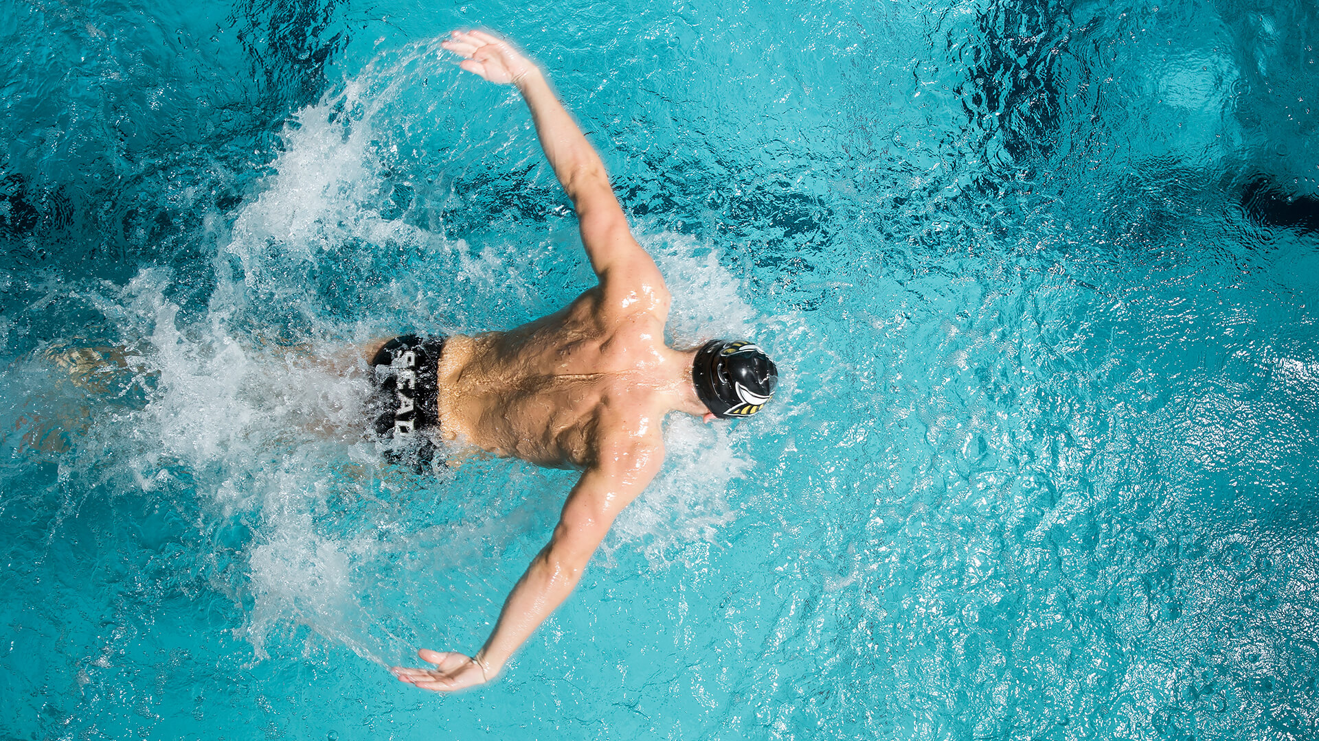 SCAD-Athletics-brand-identity-swimmer